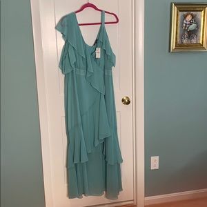 Blue ruffled dress, asymmetrical.